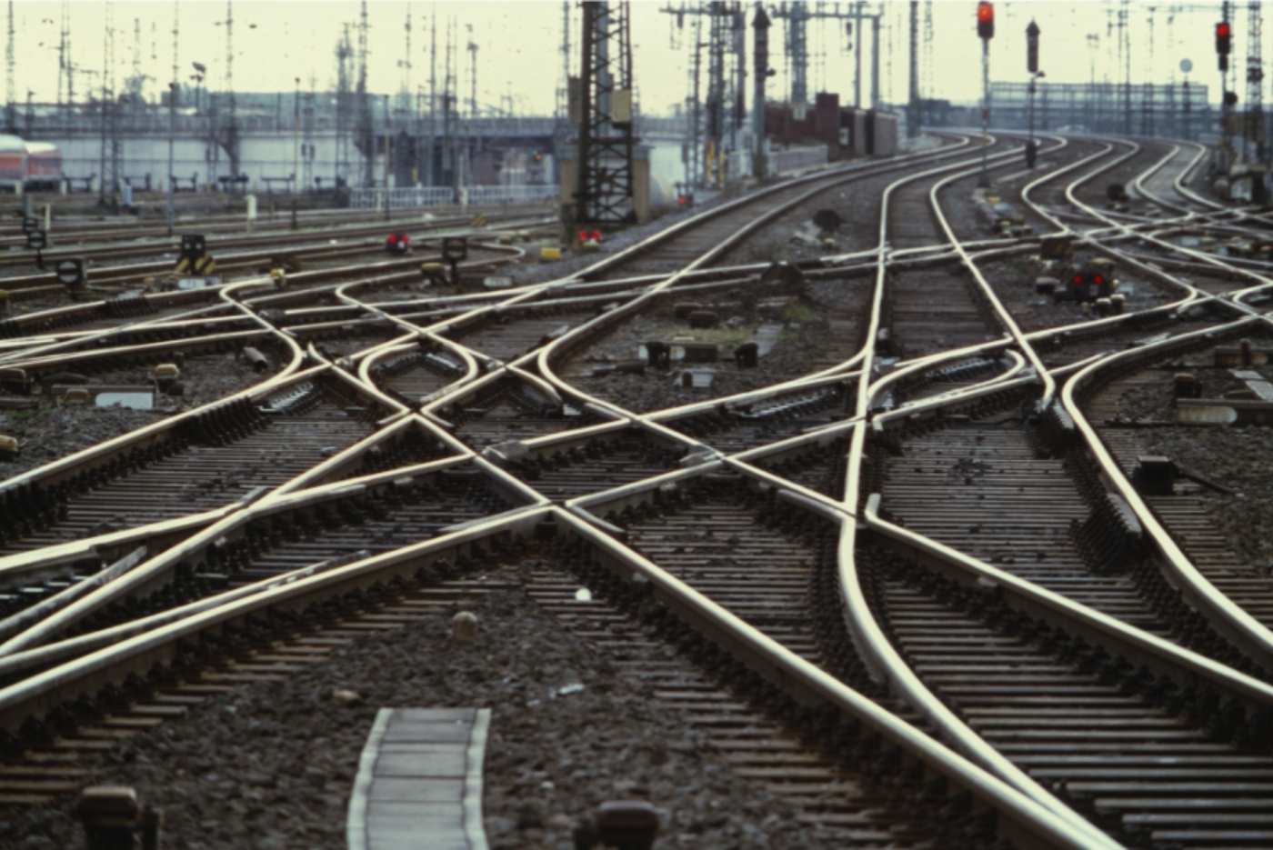 Many railway lines merging to demonstrate uncertainty with plans